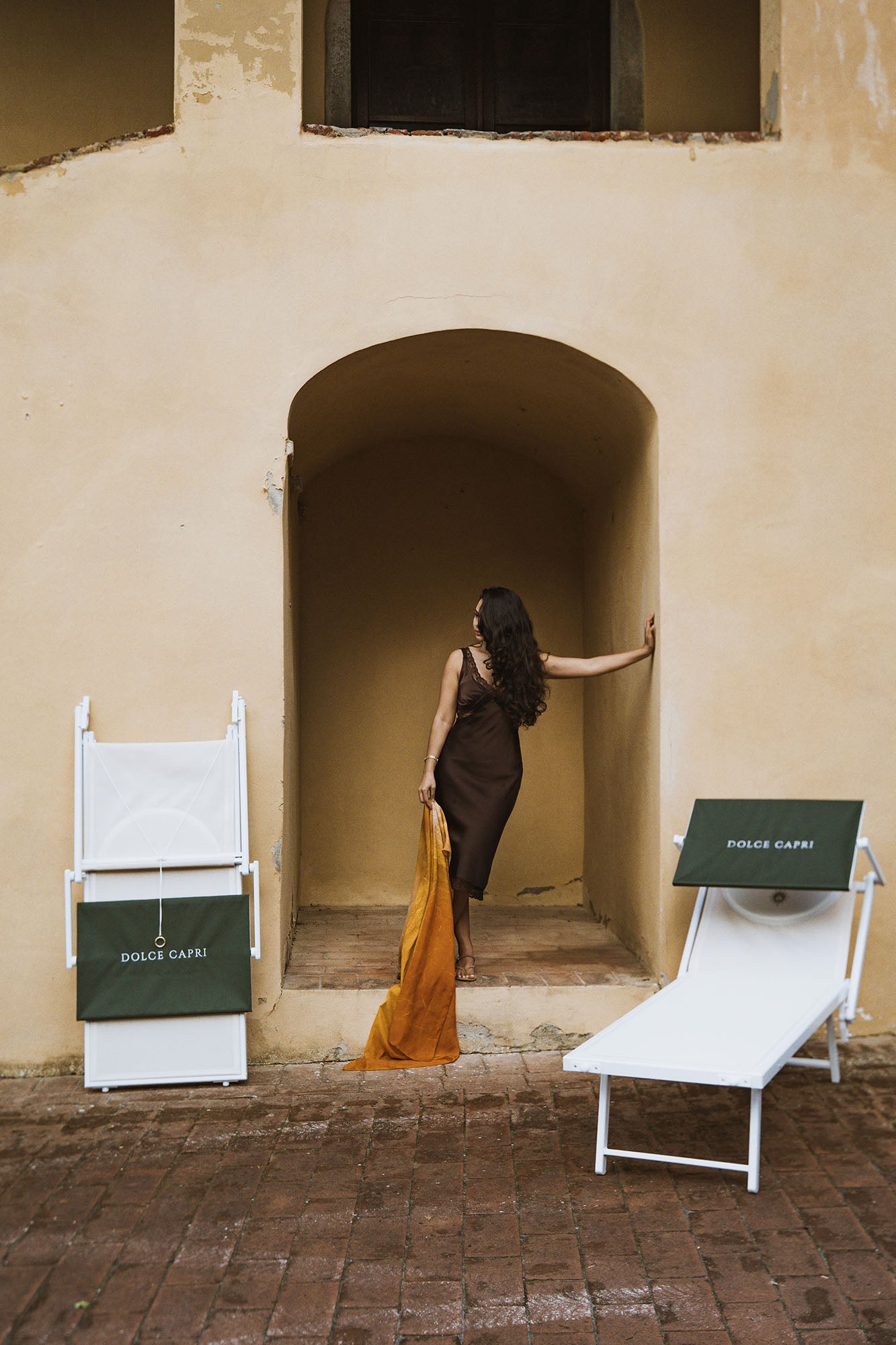 Dolce Duo sun loungers in Tuscan Olive — resort-grade aluminium frame with breathable Teslin mesh and foldable shade visors.